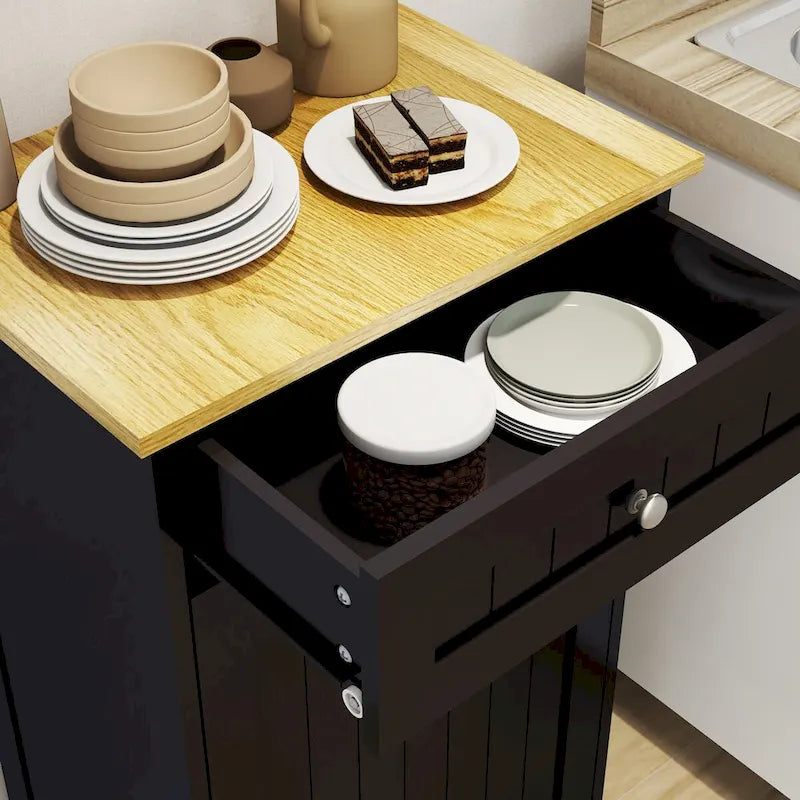 Meuble de rangement de cuisine noir avec poubelle basculante, tiroir supérieur et compartiment unique