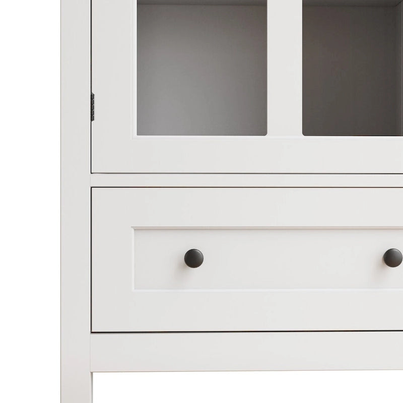 Meuble de rangement blanc à porte vitrée simple avec poignée cloche rétro et tiroir inférieur