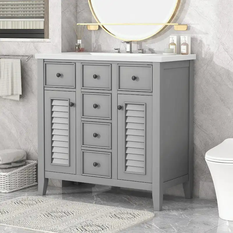 Meuble-lavabo gris-blanc en bois massif avec évier en céramique, cinq tiroirs et portes à persiennes