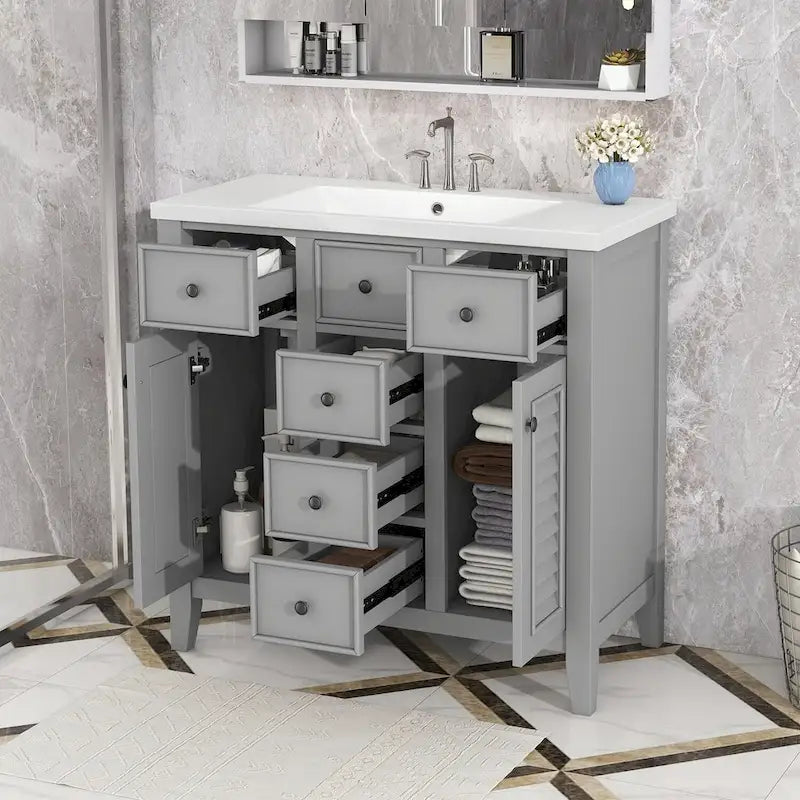 Meuble-lavabo gris-blanc en bois massif avec évier en céramique, cinq tiroirs et portes à persiennes
